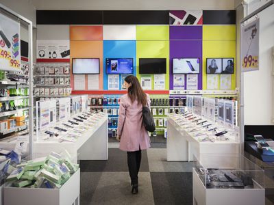 Woman in phone store.